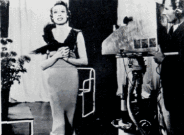 Adele Dixon opening the BBC service with a specially written song "Television".